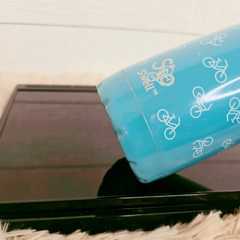 Swell Blue Bicycle Design Bottle with Silver Cap 2010